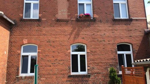 Stichbogenfenster weiß